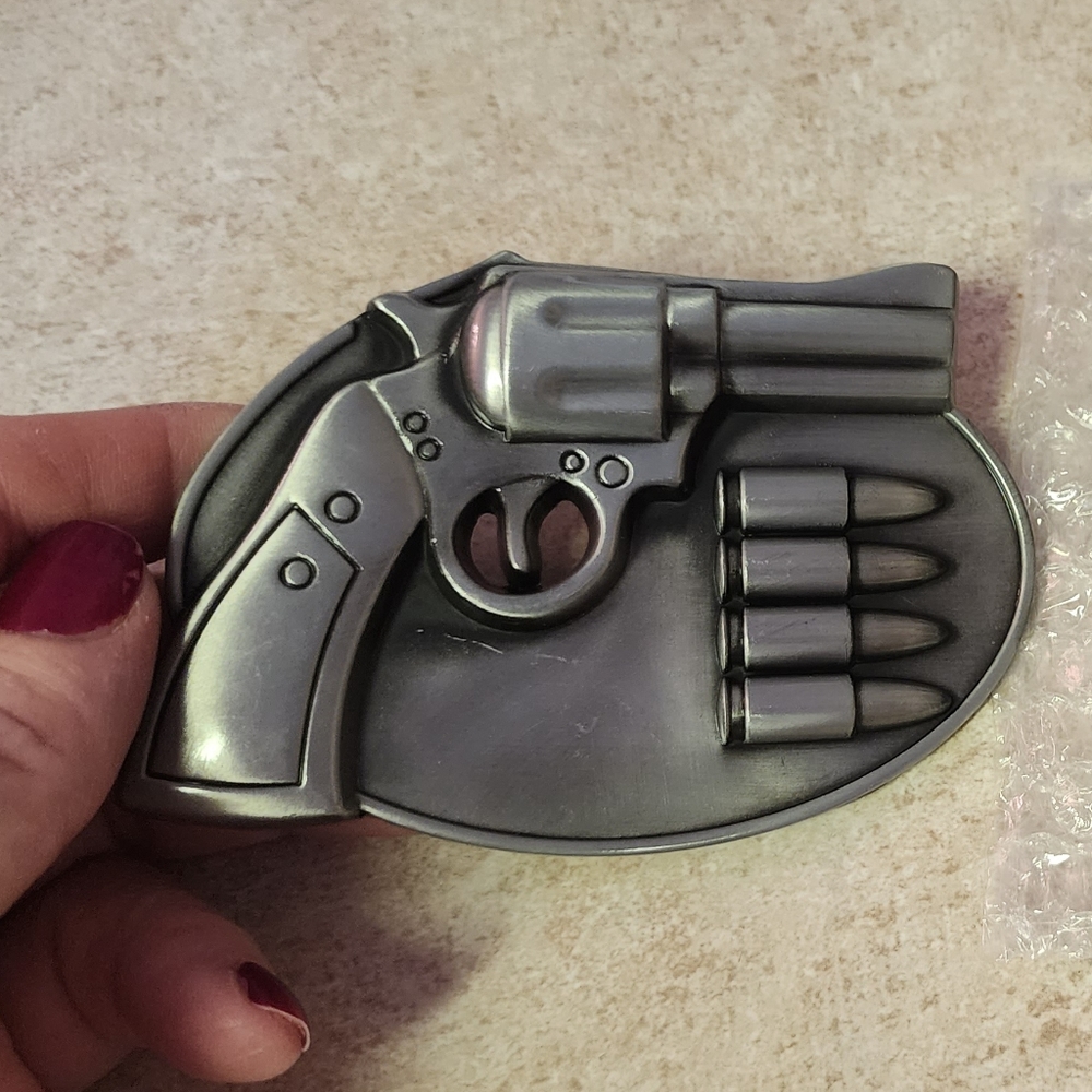 New pistol revolver belt buckle fits 1.5" belt.  Choose one